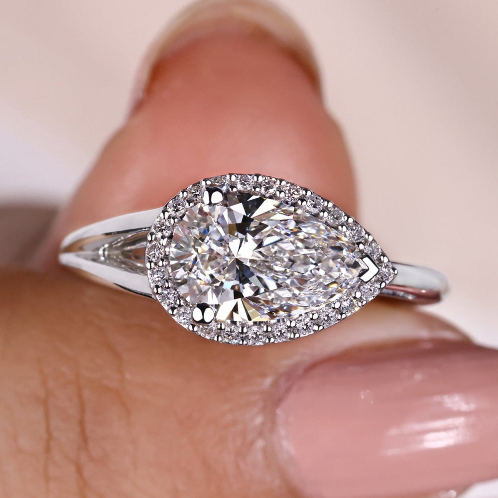 Pear shaped diamond ring with a lab-grown diamond.
