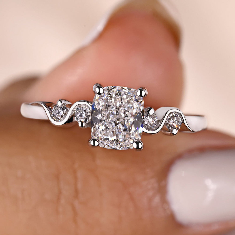 5 stone diamond ring with a lab-grown diamond.
