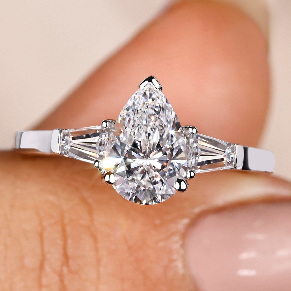 Pear cut engagement ring showcasing a stunning pear-shaped diamond, perfect for timeless elegance and unmatched brilliance.
