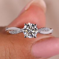 Twist Engagement Ring Featuring Round Brilliant Diamond