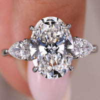 Three Stone Oval Engagement Ring – Pear Side Stones