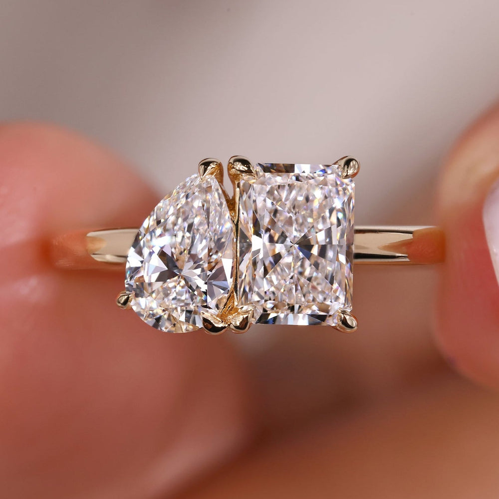 Toi et moi ring featuring a radiant cut ring design for added brilliance.
