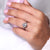 Seven stone engagement ring with claw prong set and fishtail prong setting.