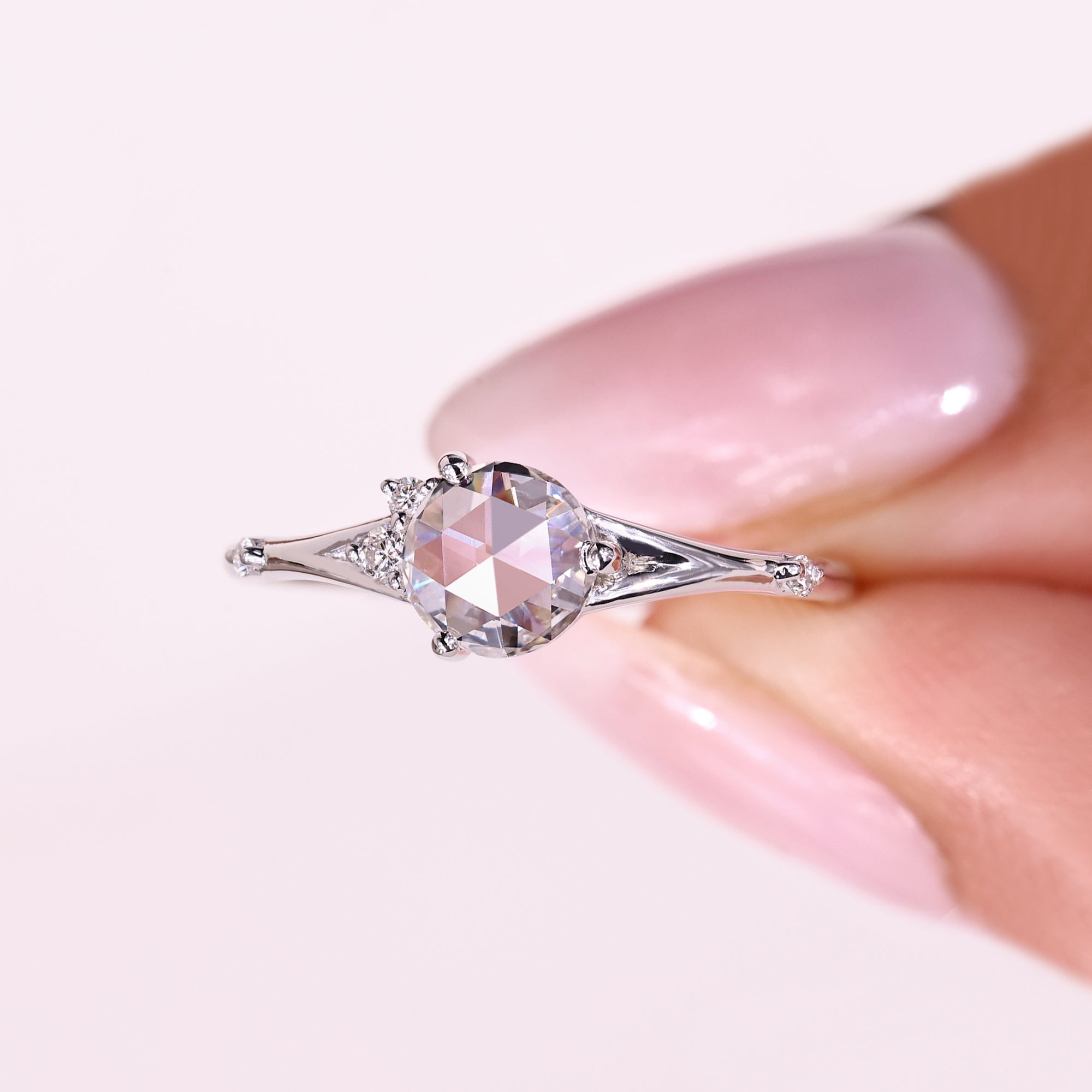 Five stone ring with round rose cut diamond.
