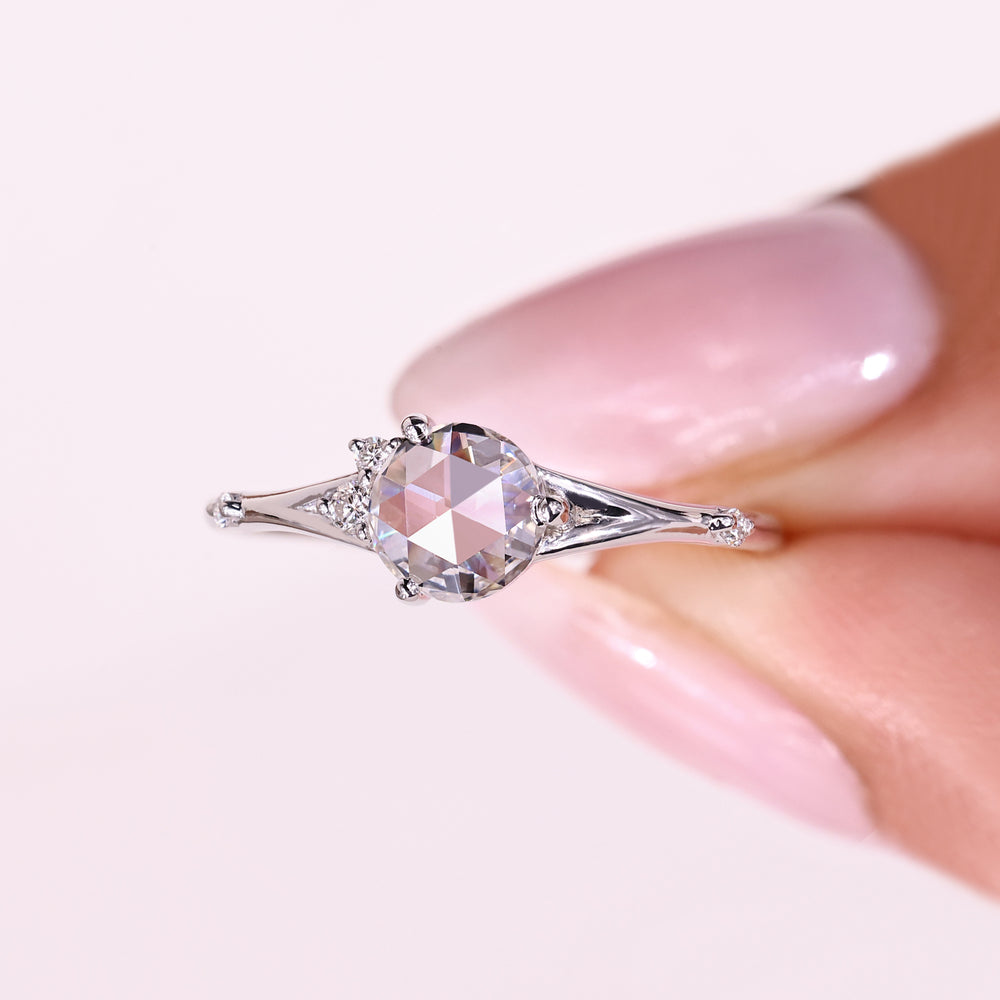 Five stone ring with round rose cut diamond.
