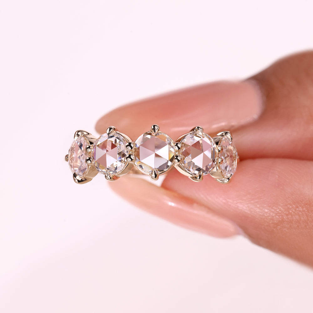 Round rose cut diamond half eternity band.
