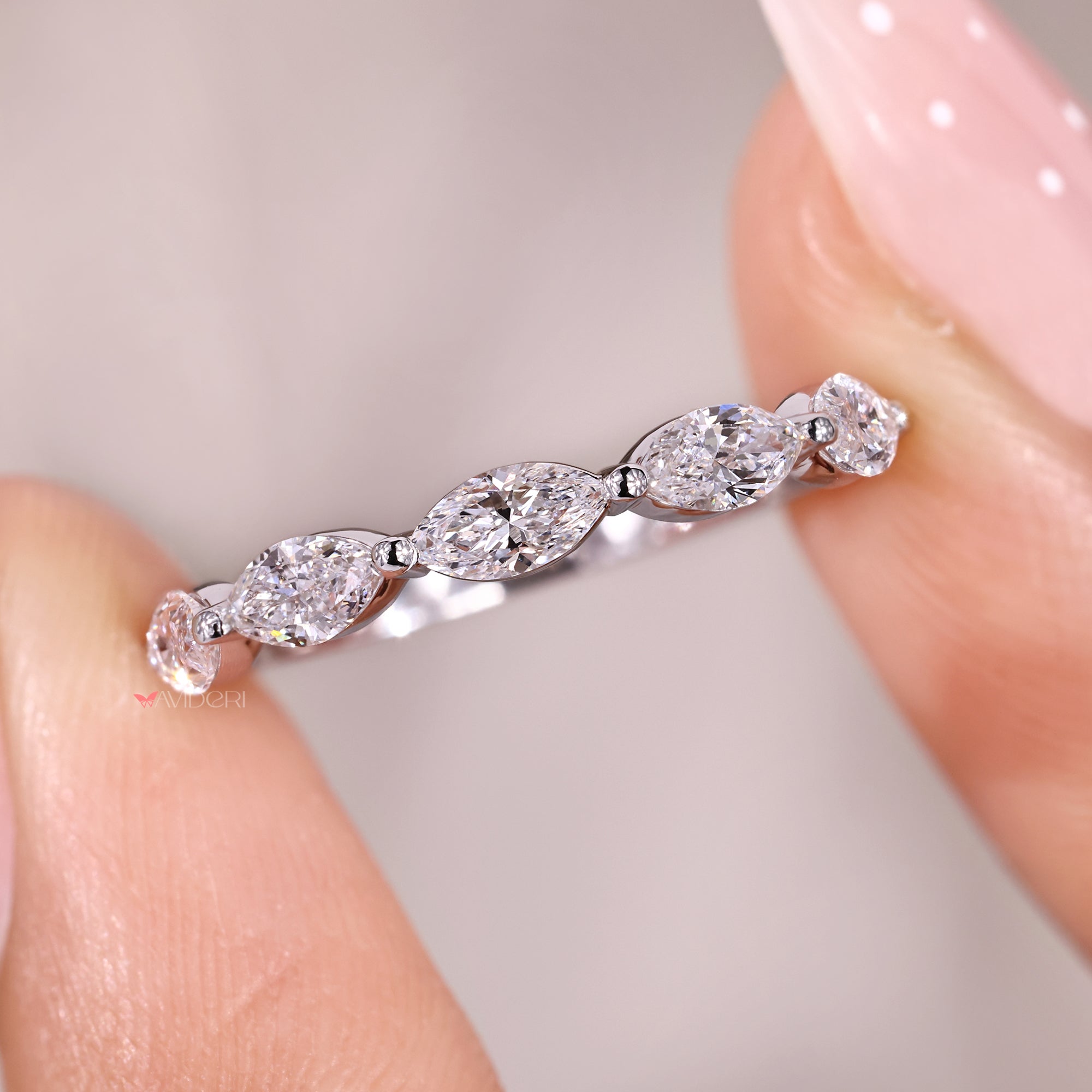 Avideri wedding band in marquise diamond wedding band look.