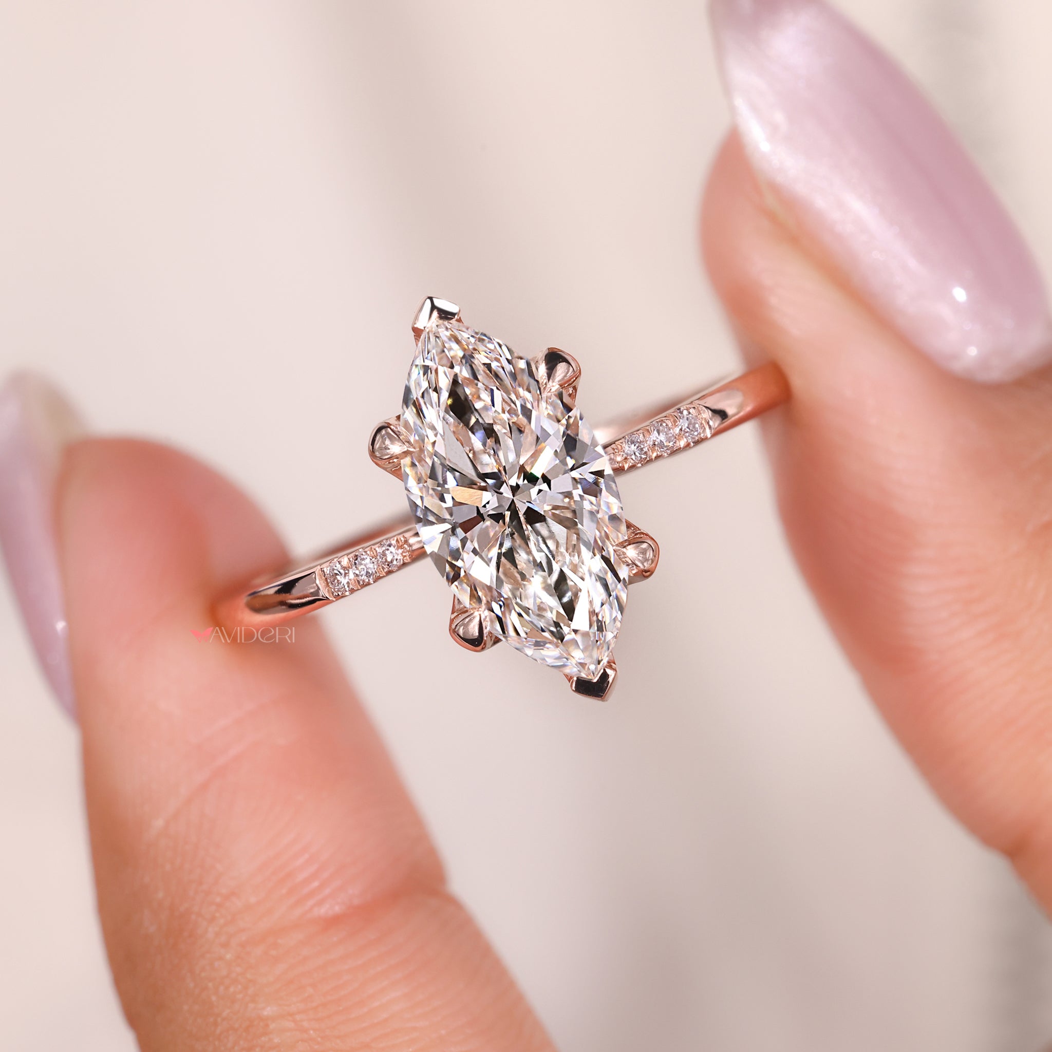 Tulip setting ring adds soft floral detail to the rose gold band.
