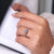 Classic round diamond ring with a sleek four prong setting, perfect for any occasion.