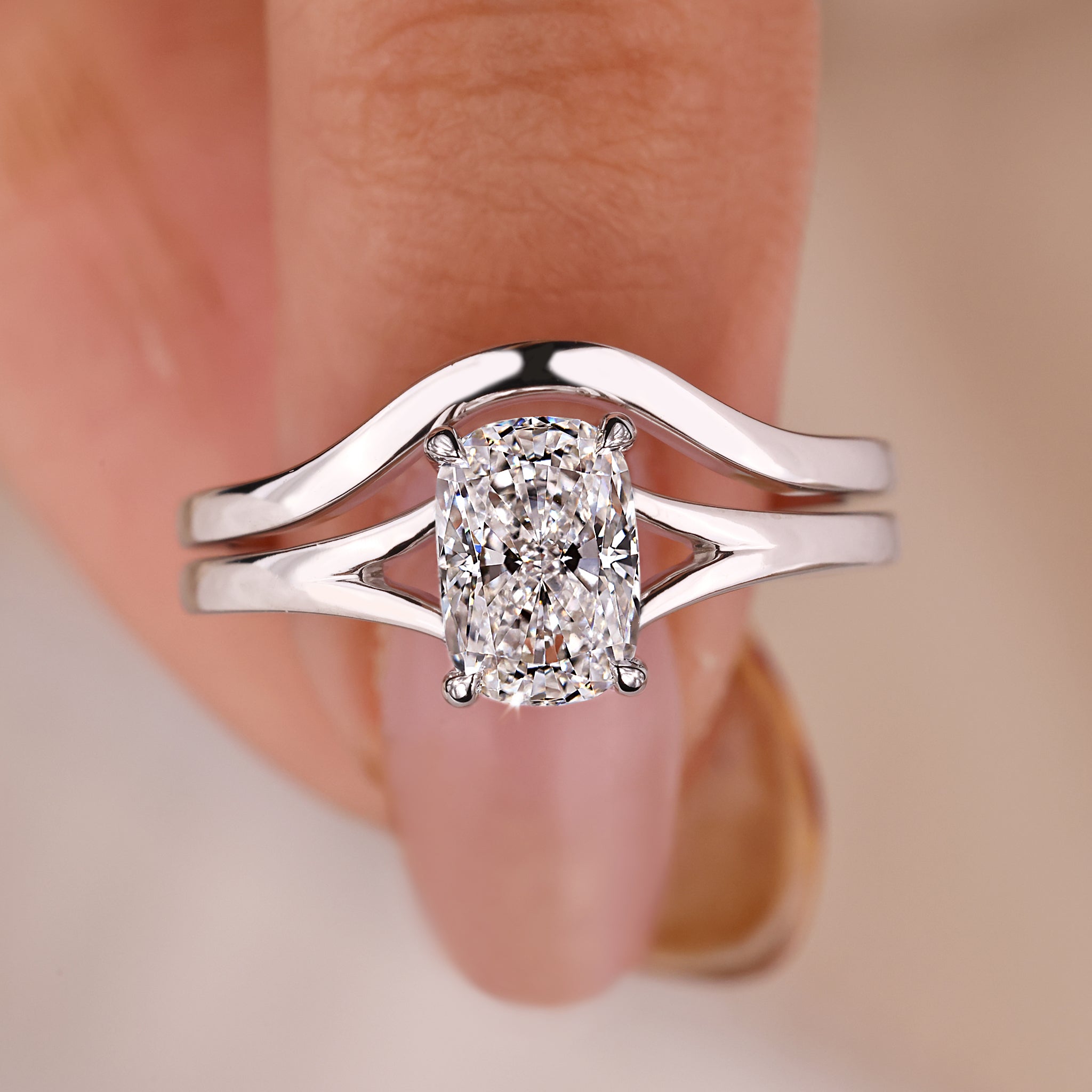 Cushion cut ring with classic wedding band in white gold.