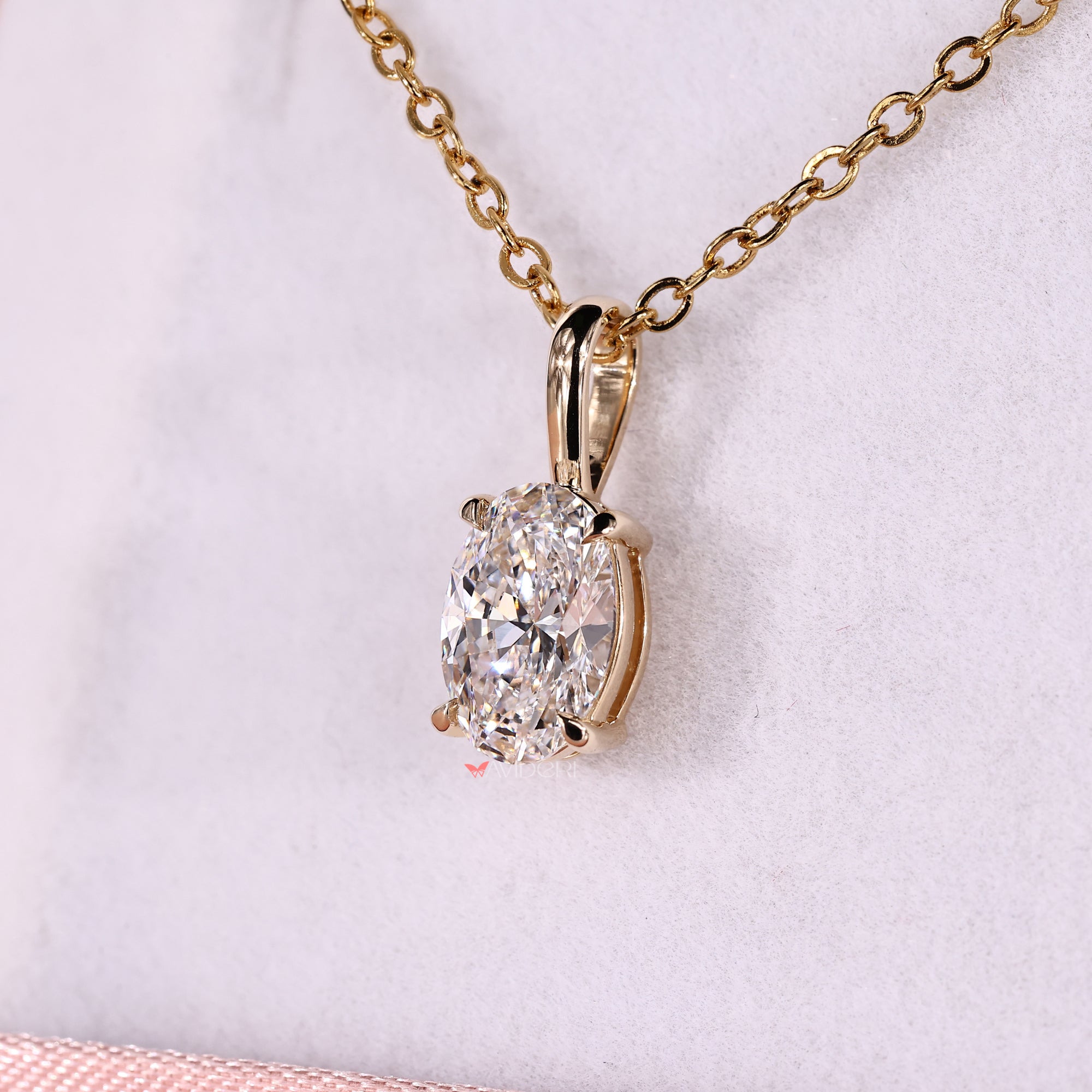 Handmade pendant in oval cut design for a simple style.