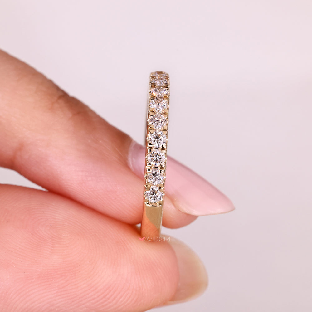 Handmade round diamond half eternity band.

