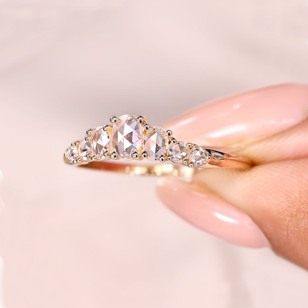 Prong set half eternity diamond wedding band.
