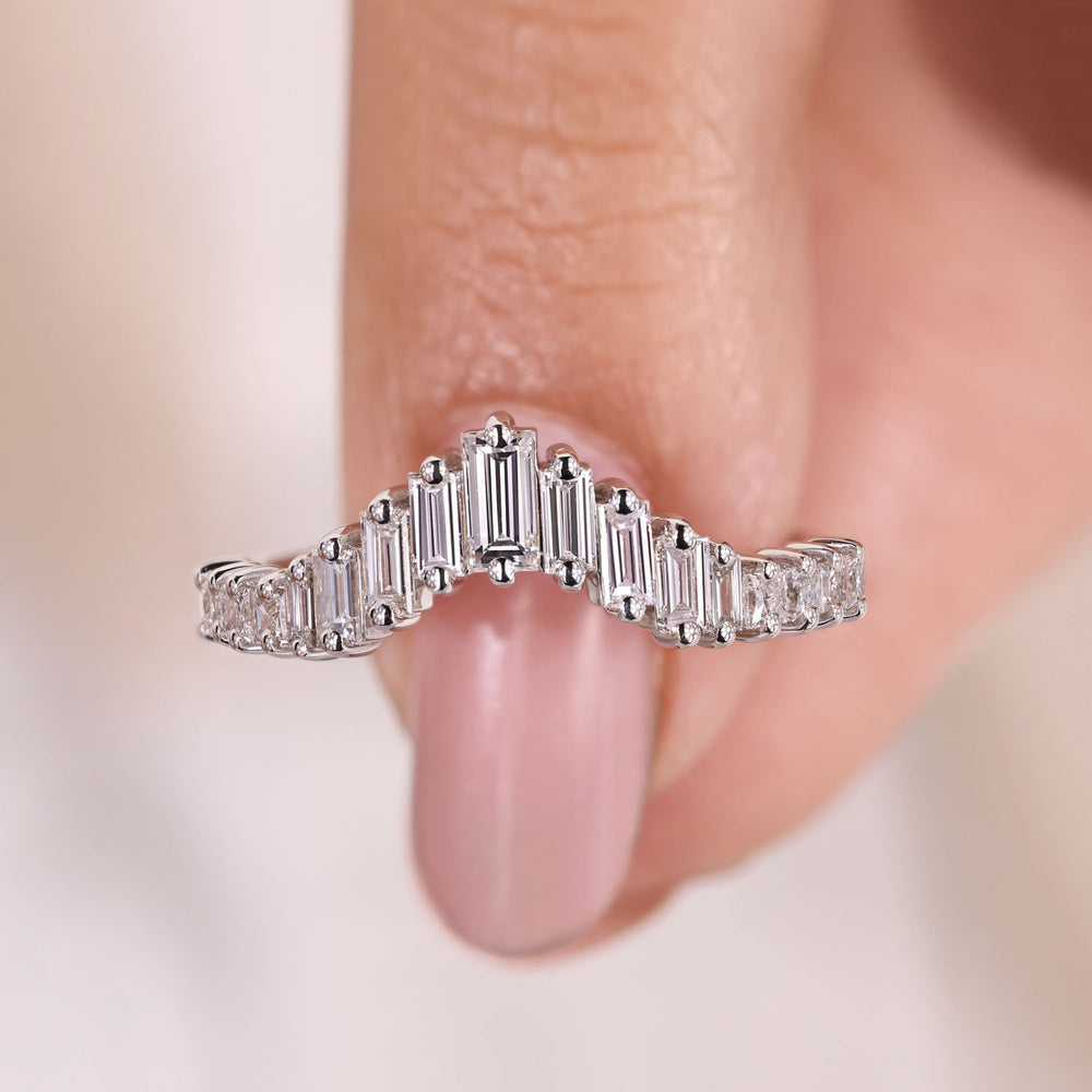 Half eternity wedding band with princess and baguette diamonds.
