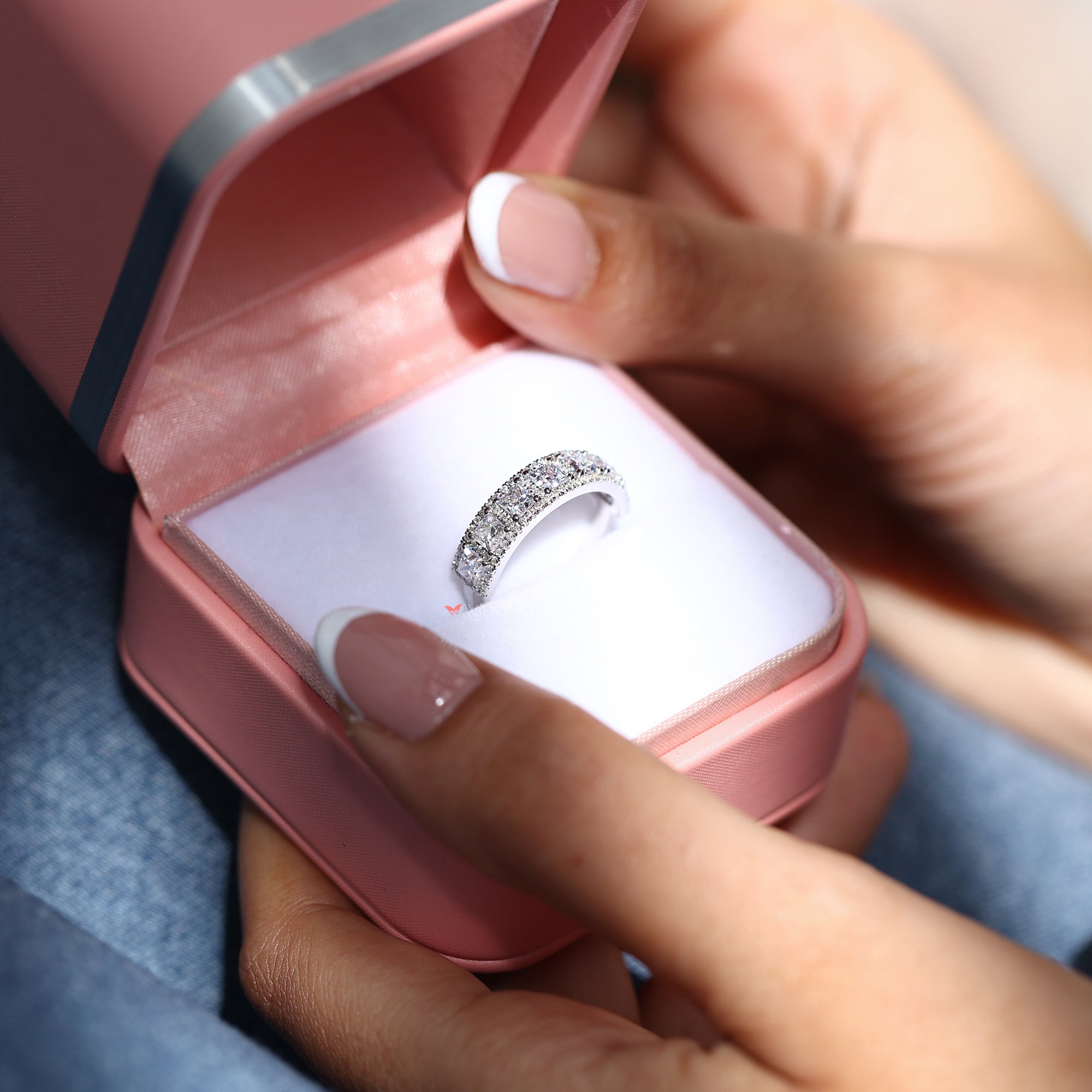 Halo setting Moissanite wedding band design.