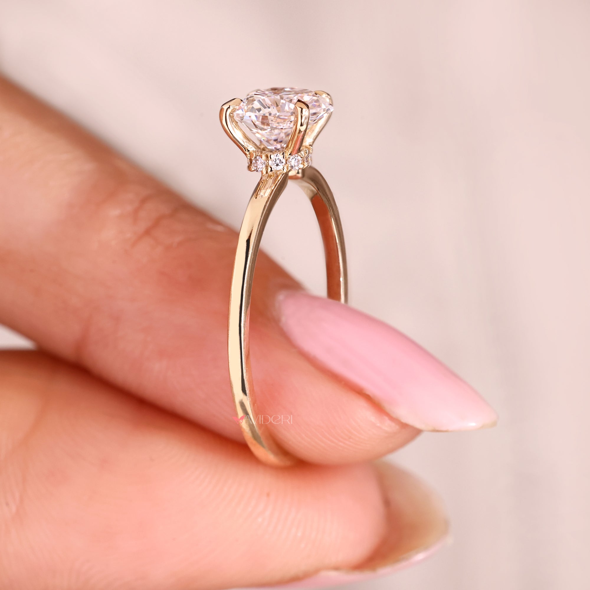 Lab grown heart cut diamond ring with hidden halo style.
