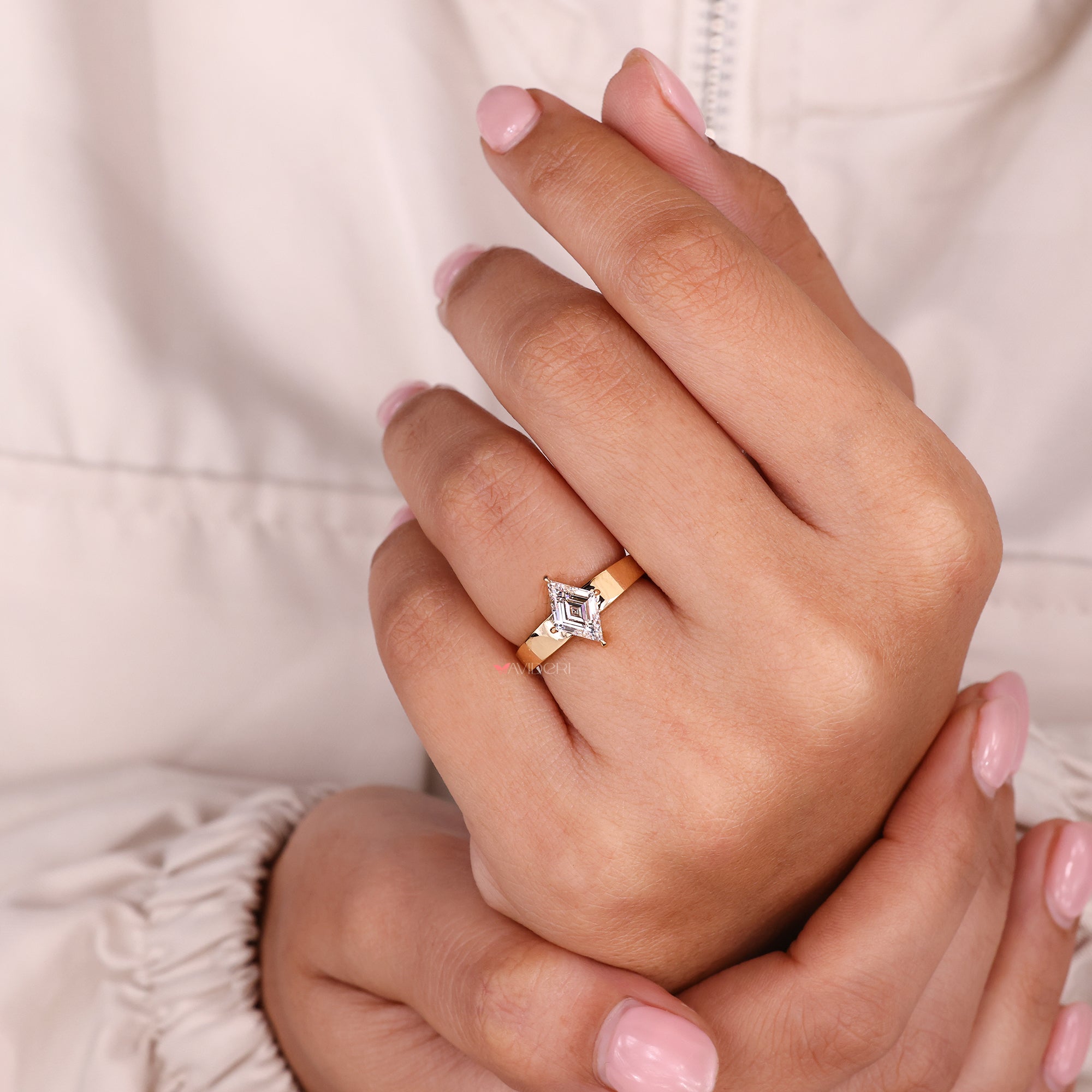 Lab-grown ring with yellow gold engagement ring.