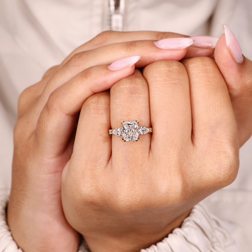 Three stone cushion diamond ring pave style.
