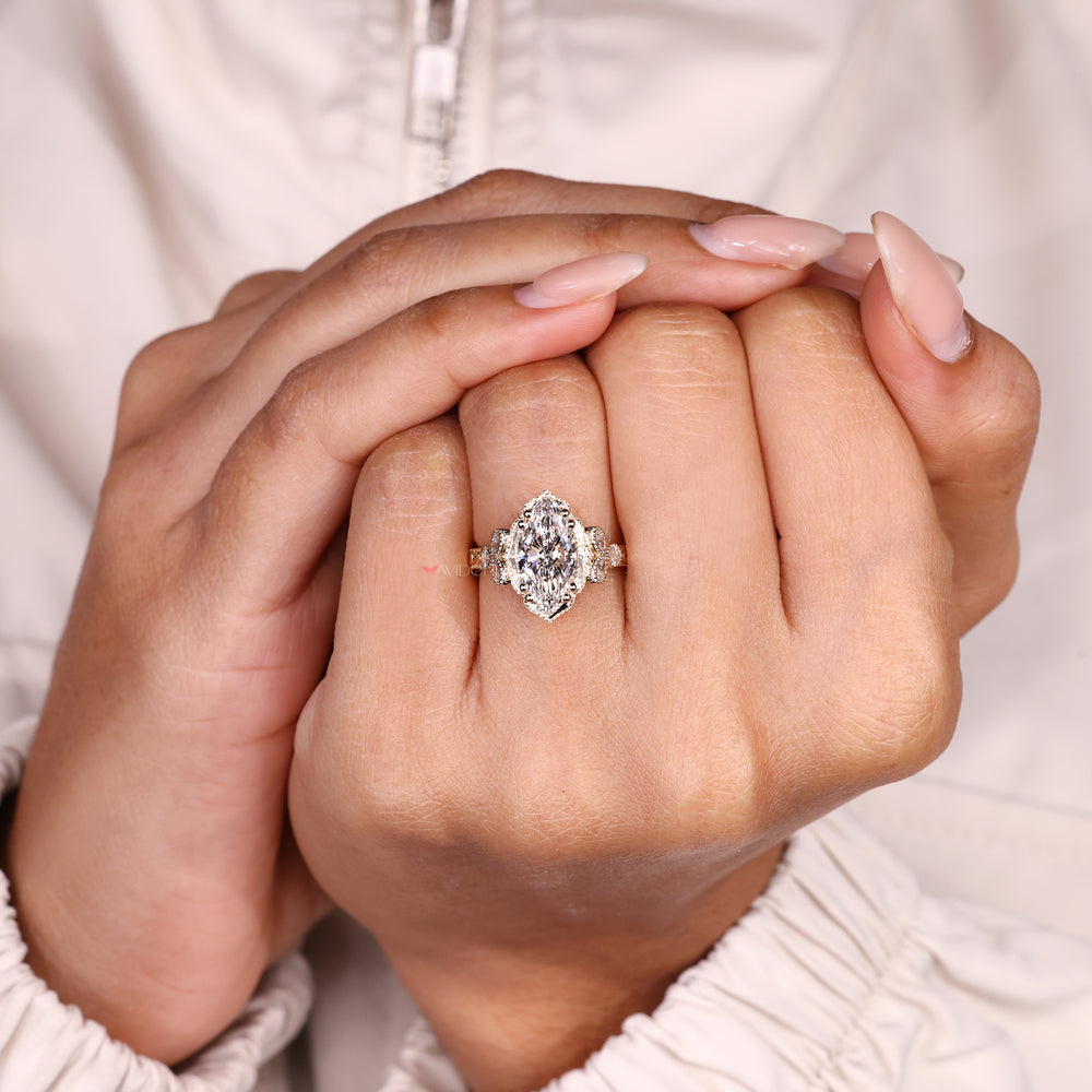 Art deco marquise diamond ring with milgrain and prongs
