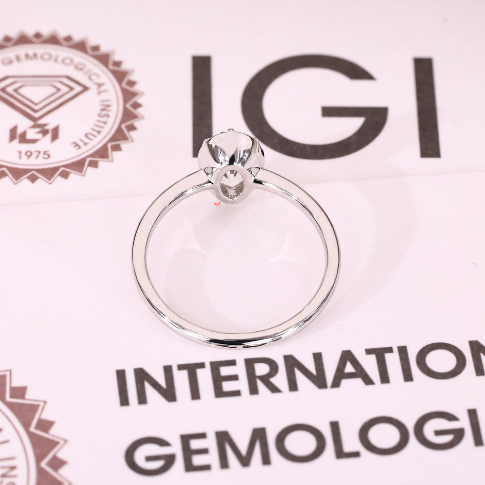 IGI certified oval solitaire diamond engagement ring.