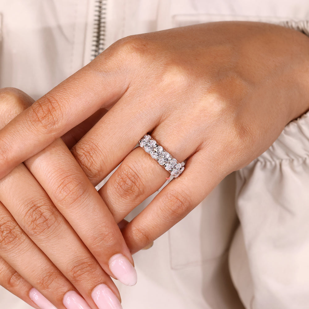 Handmade oval diamond band with pave setting.
