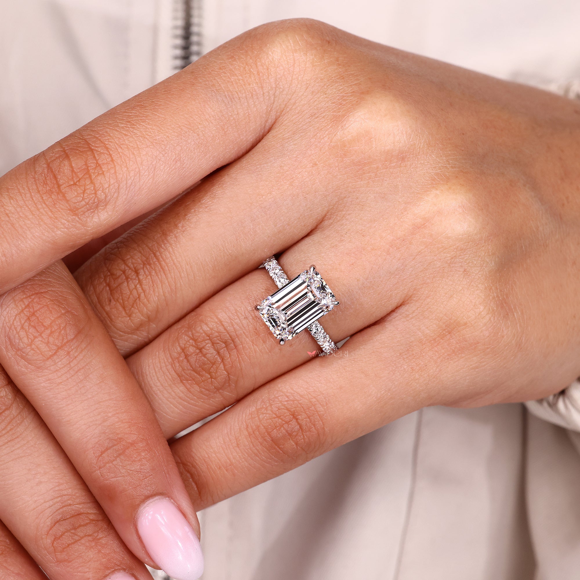 IGI certified lab grown emerald cut diamond ring.
