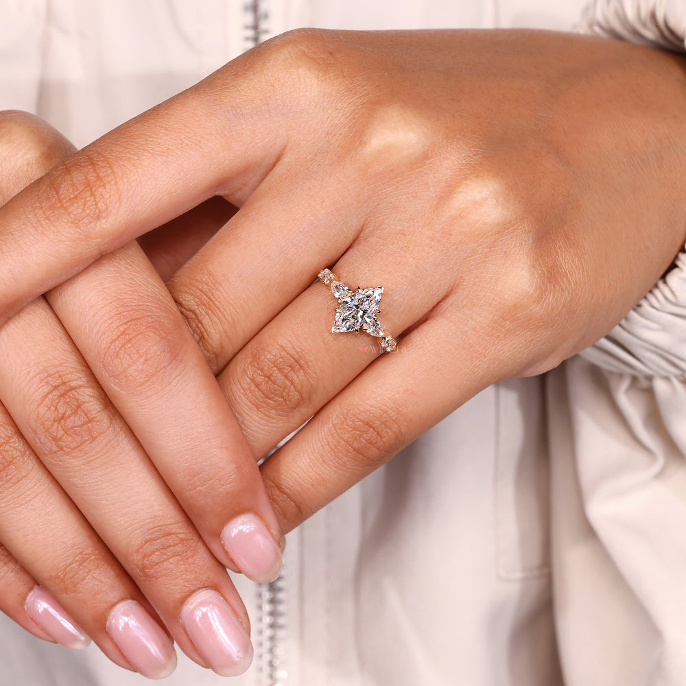 Shared prong pave marquise ring prong setting.
