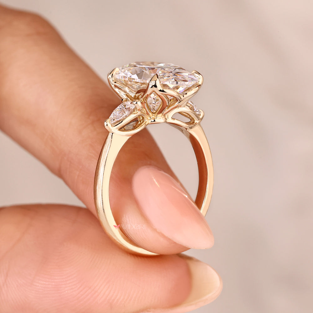Oval cut diamond ring with tulip basket setting.
