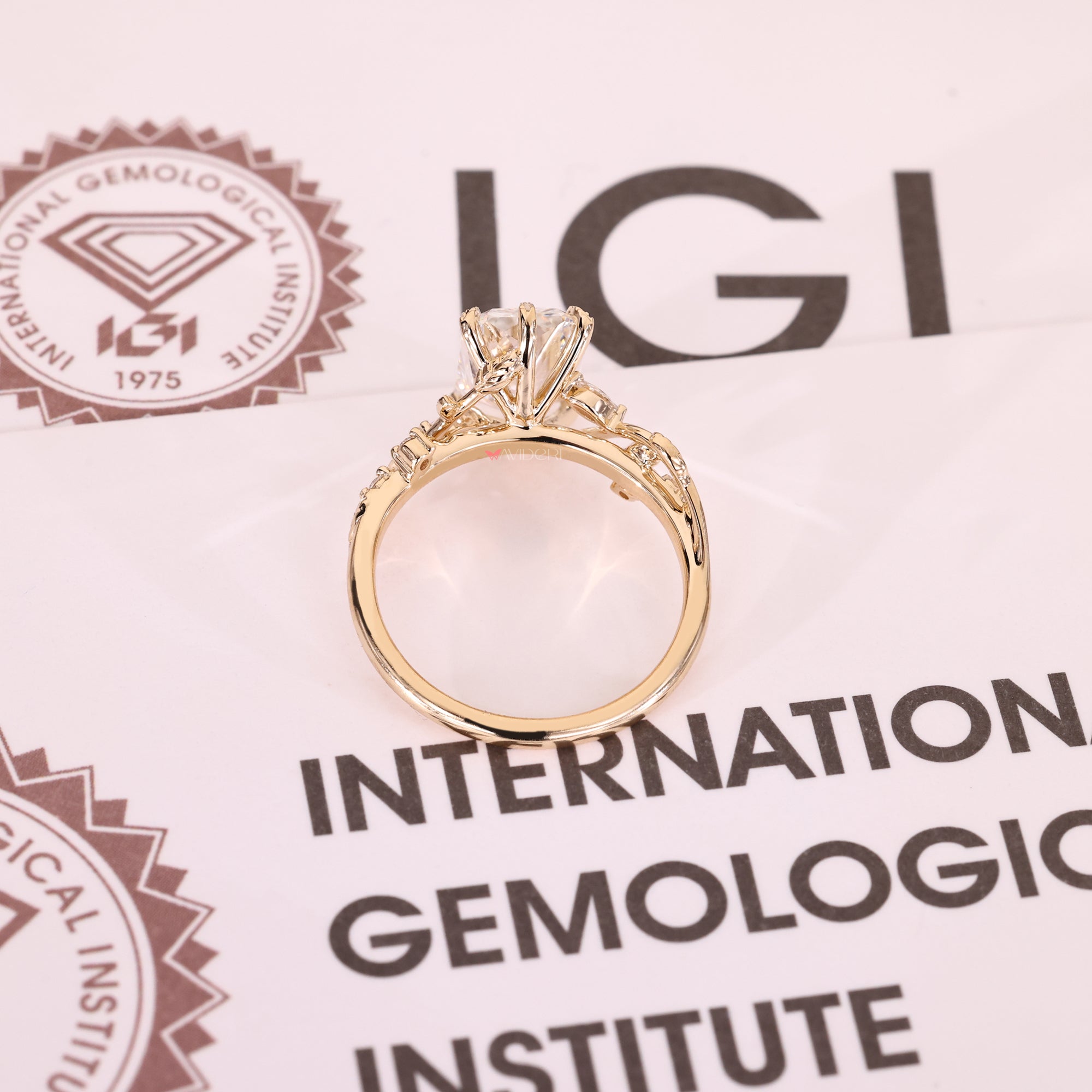 Yellow gold engagement ring with radiant cut engagement ring.
