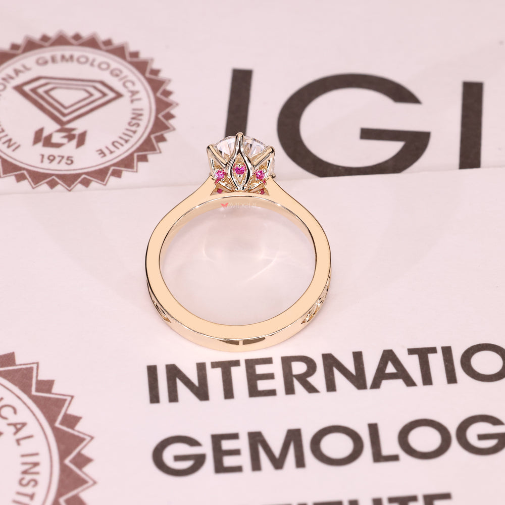 Pink ruby oval diamond ring with round hidden halo
