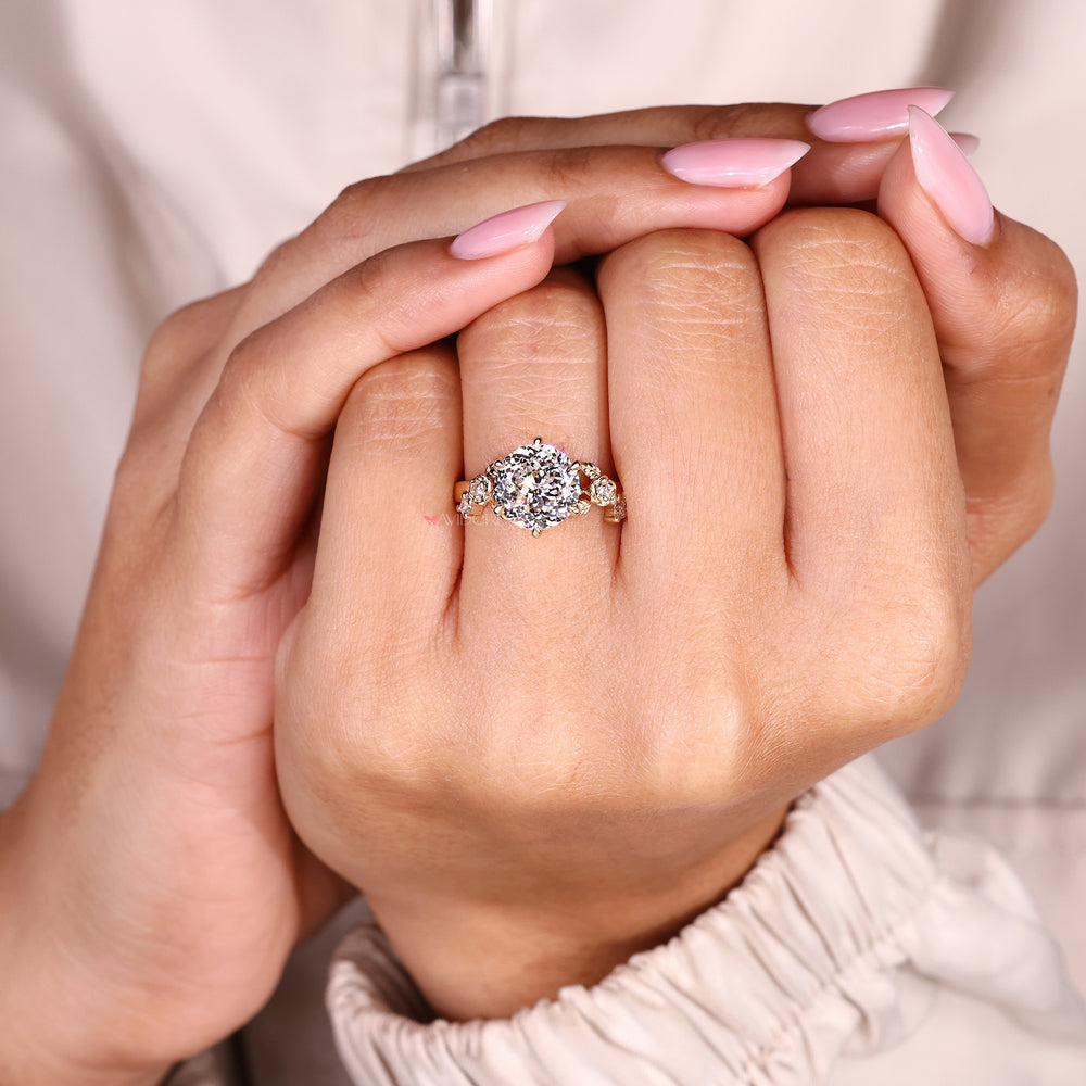 Handmade nature inspired diamond ring featuring Portuguese cut center stone
