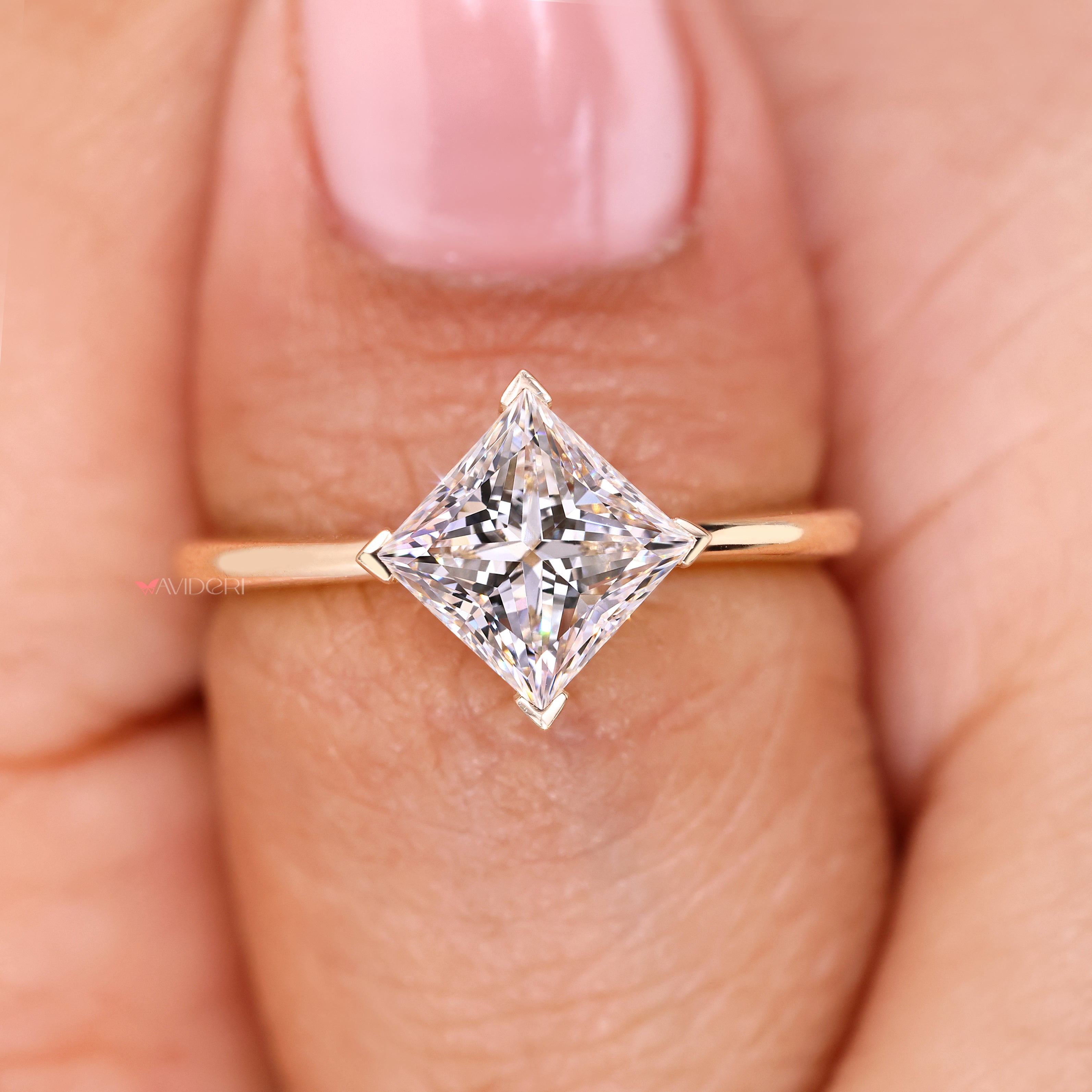 Handmade princess cut ring with solitaire design.
