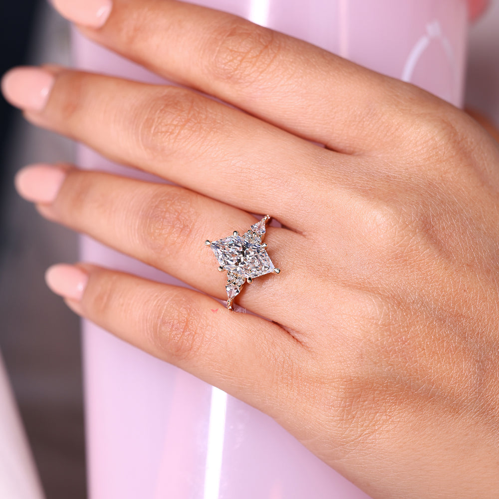 Marquise moissanite ring with round halo vintage style.
