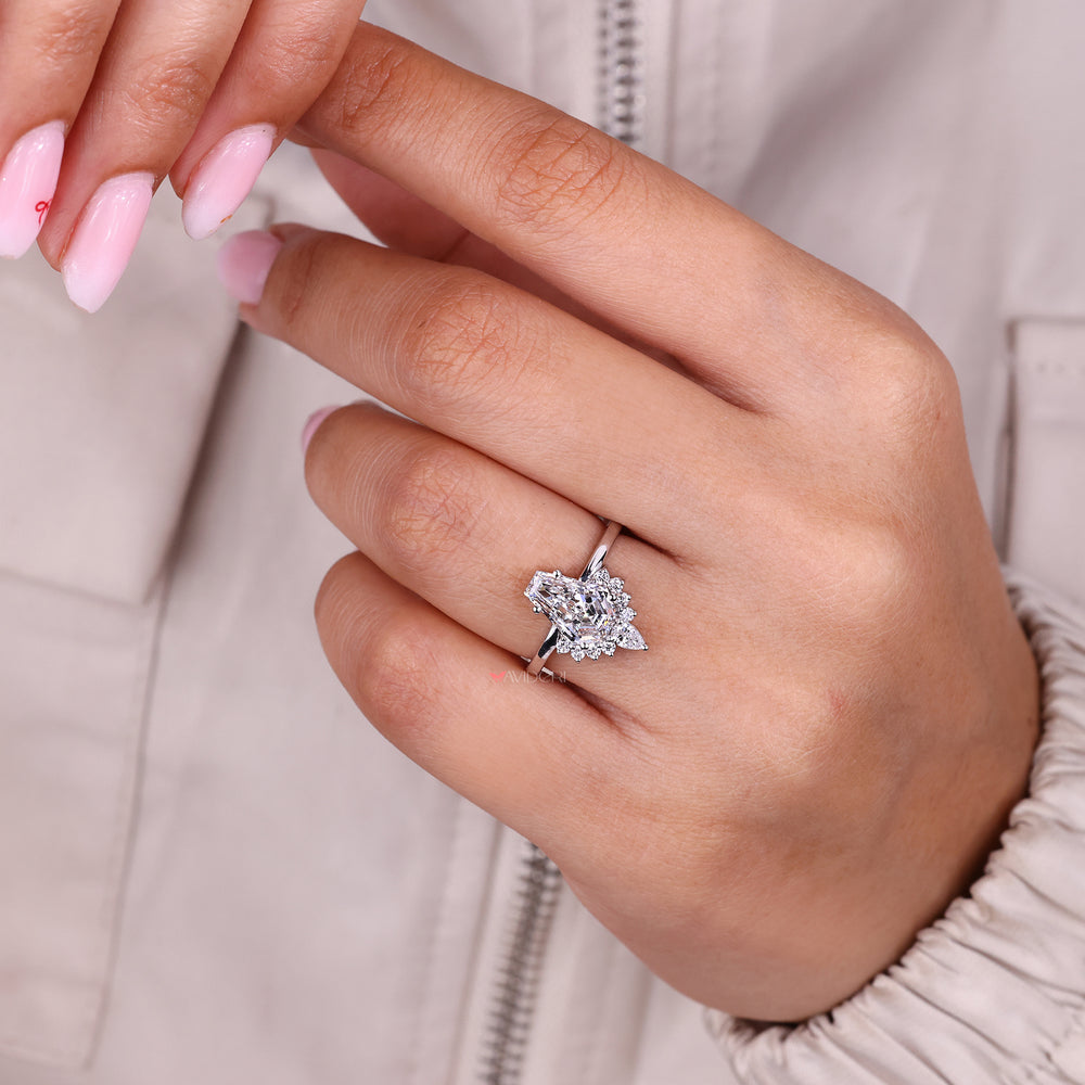 Handmade jewelry ring with pear cut diamond.