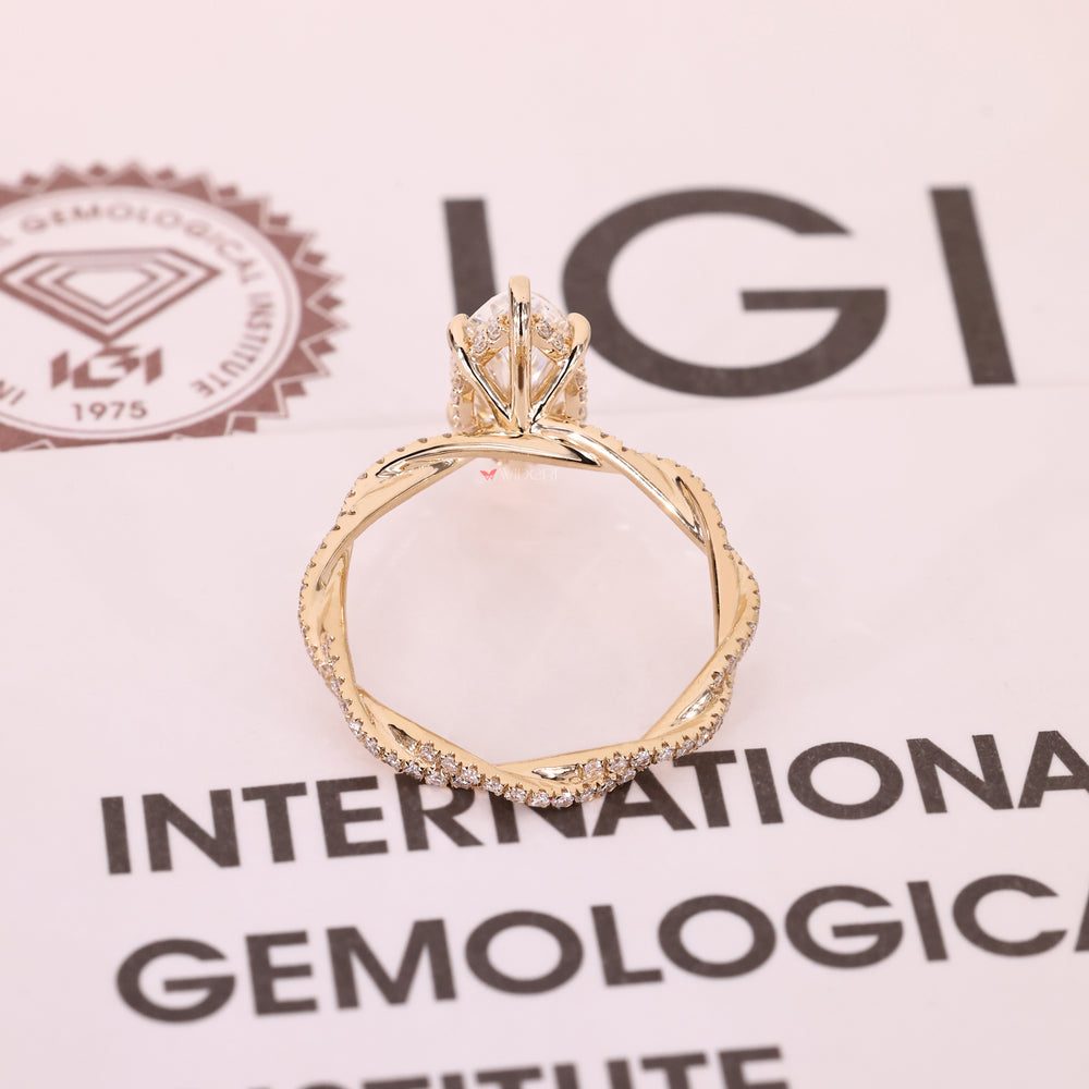 IGI certified marquise cut diamond ring with halo.
