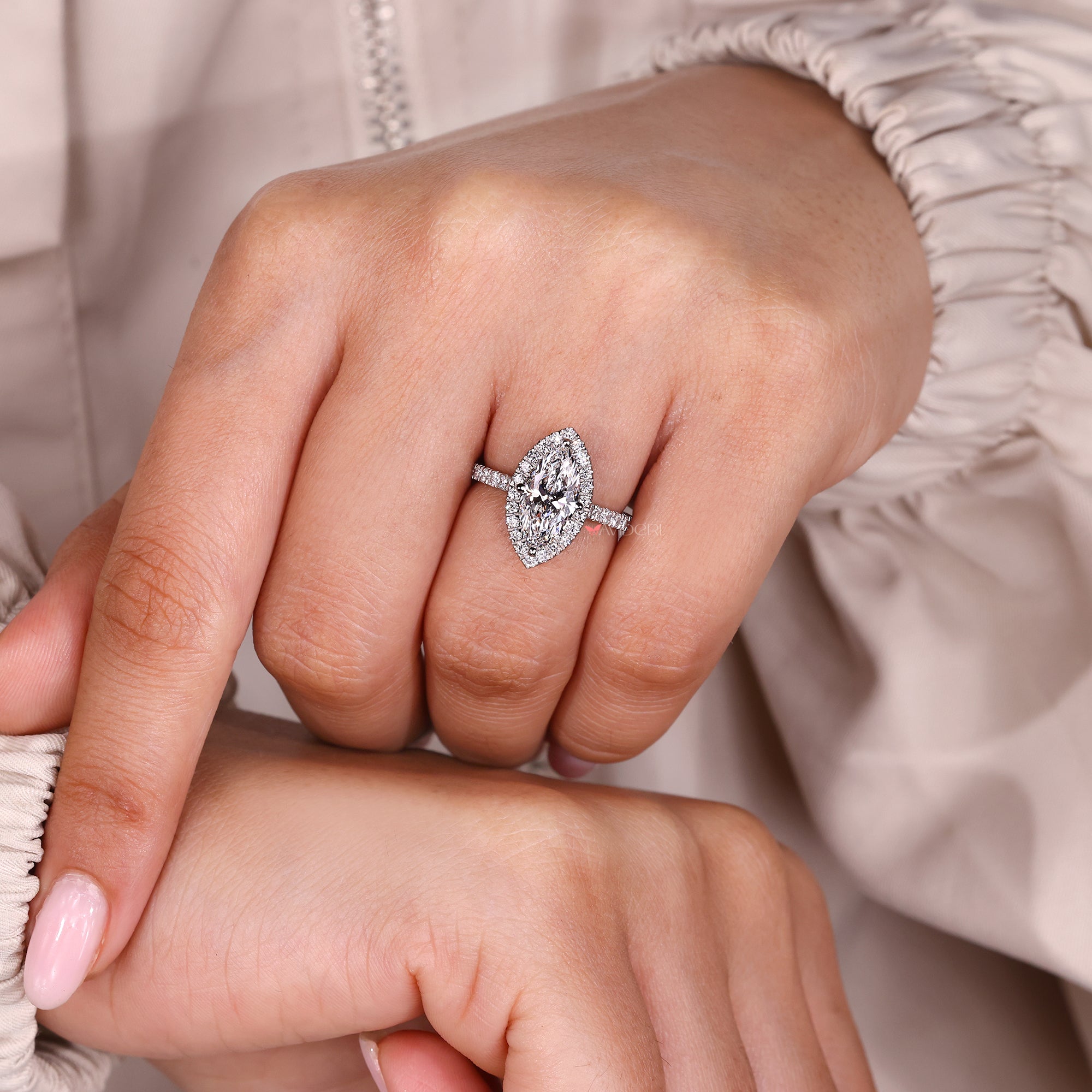 White gold engagement ring with lab-grown ring.