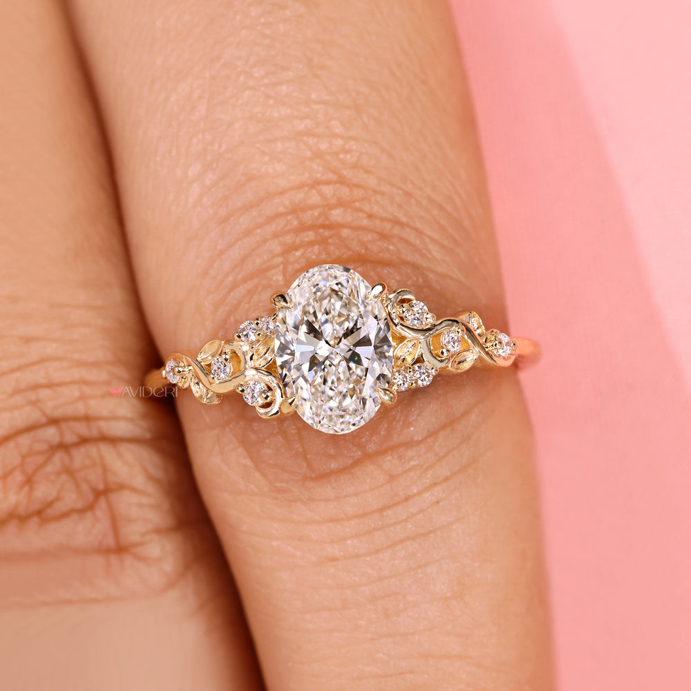 Oval cut ring with round side stone accents.
