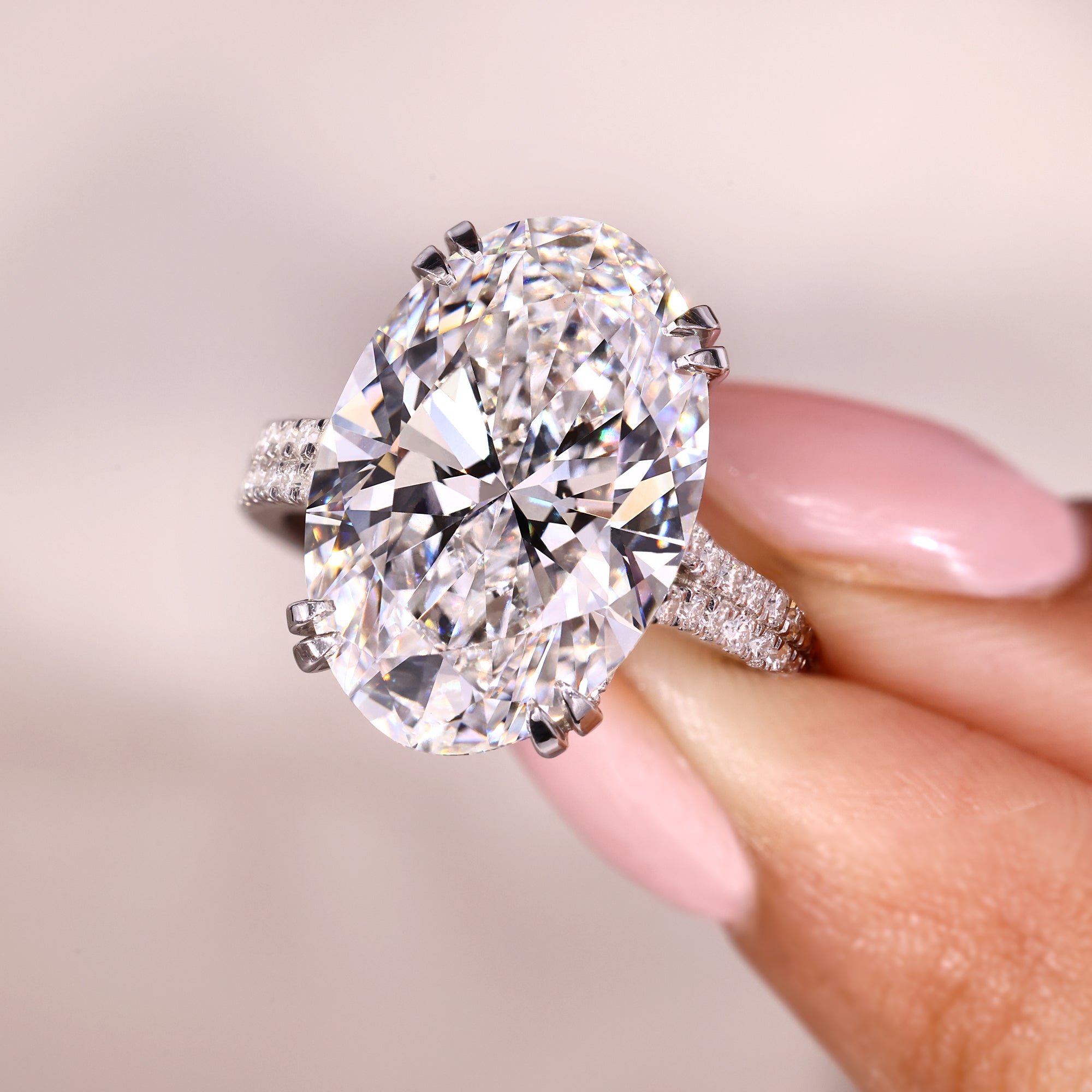 Oval lab grown diamond ring available in 8 to 12 carats.