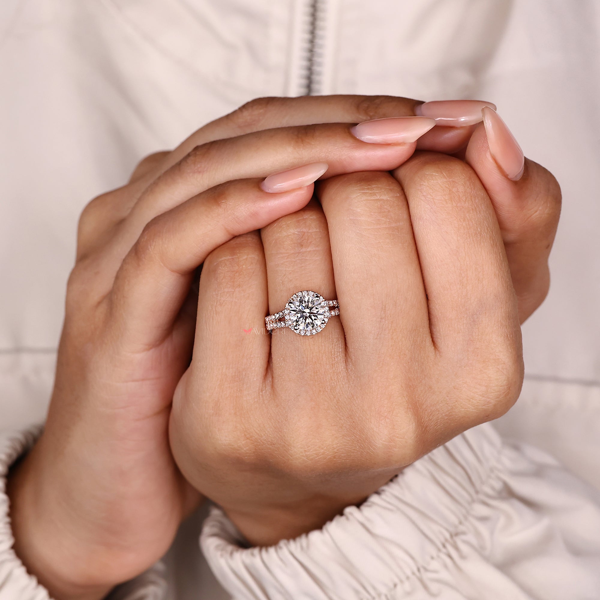 Round diamond ring with split pave band design.
