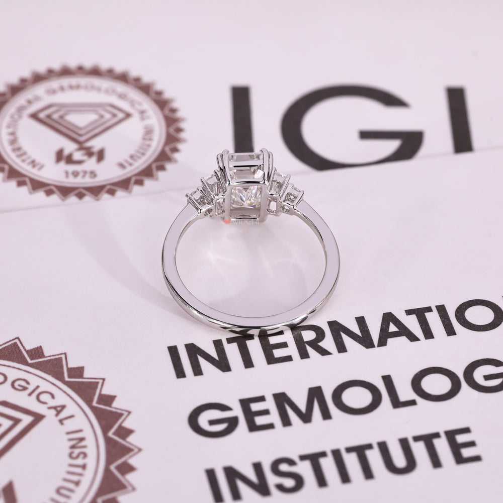 IGI certified emerald cut five stone diamond ring.
