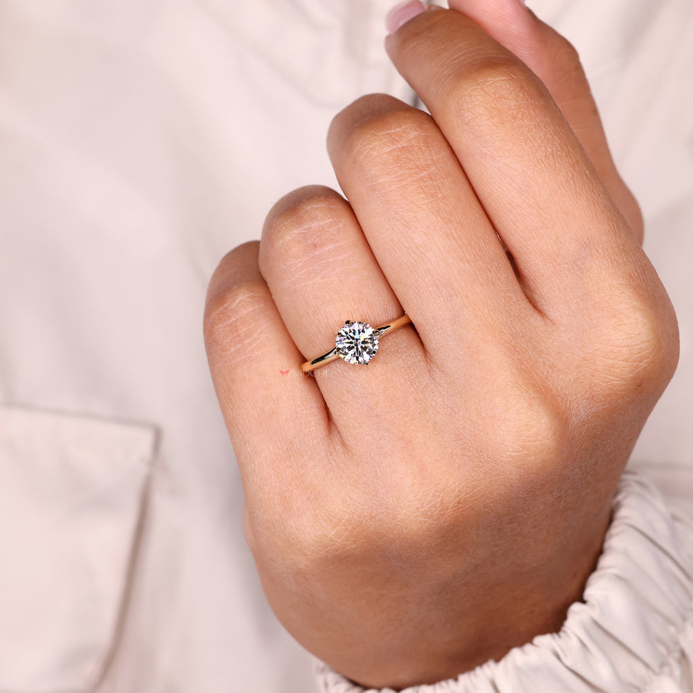 Round lab diamond ring with solitaire and bypass setting.
