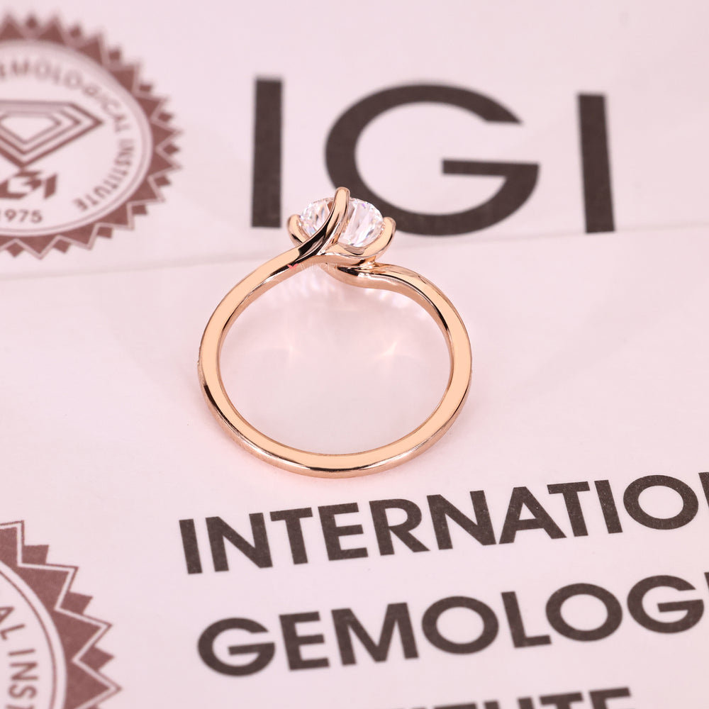 IGI certified round diamond ring with pave detail.
