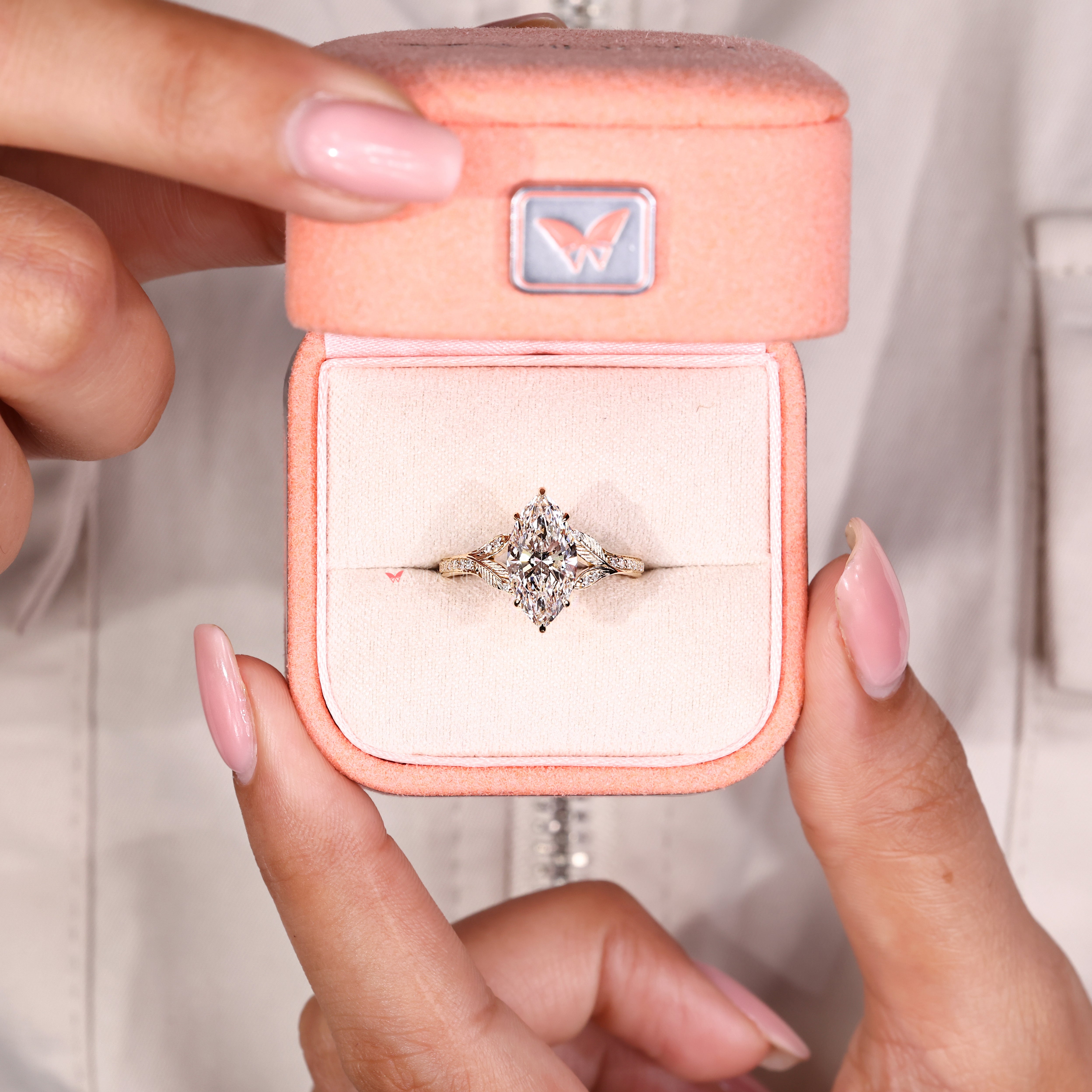 IGI certified marquise diamond ring with basket setting design
