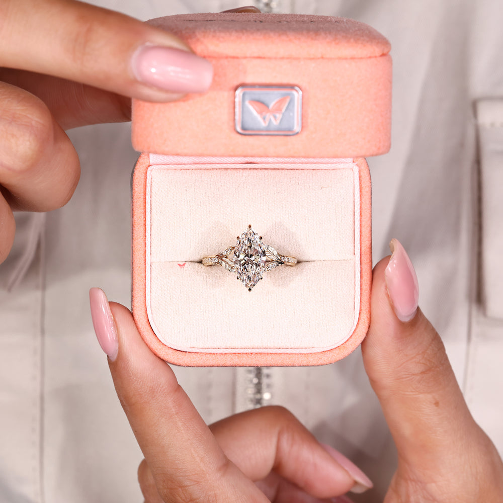 IGI certified marquise diamond ring with basket setting design
