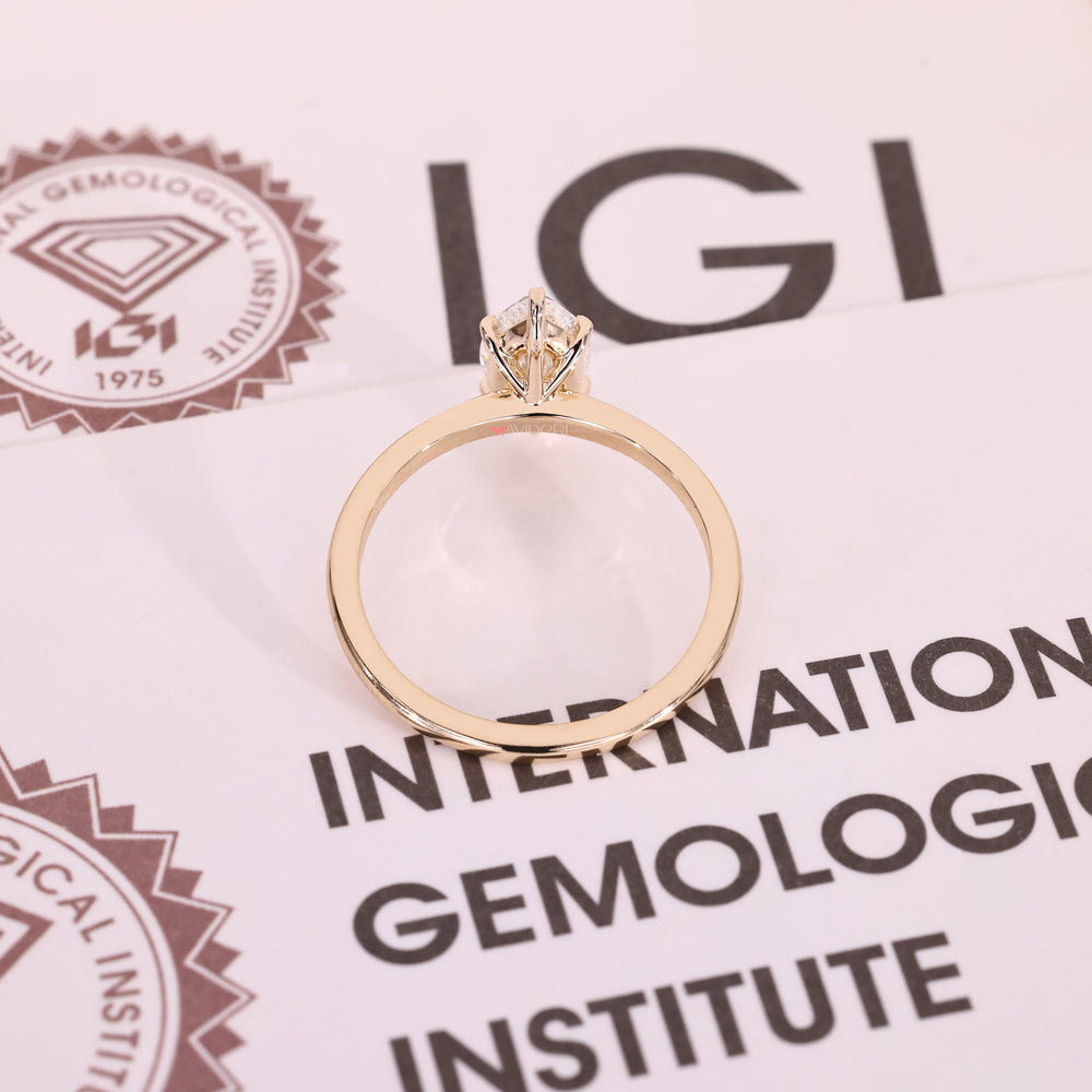 Marquise cut IGI certified diamond ring in classic solitaire.
