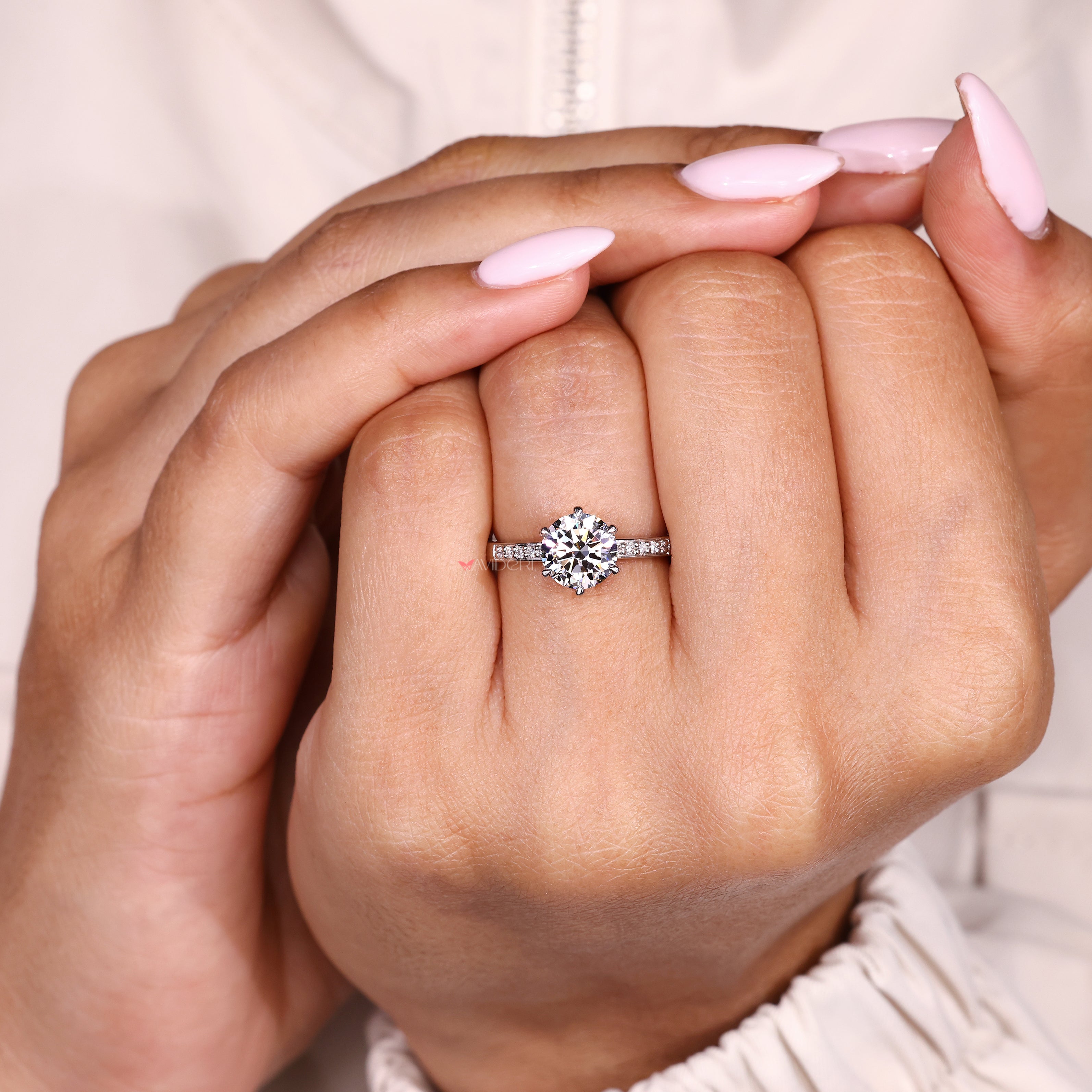 Lab grown diamond ring with round center and pave
