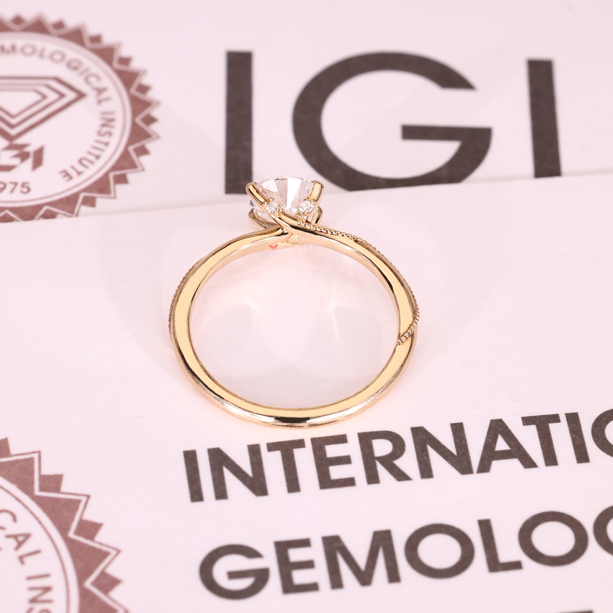 IGI certified round cut diamond ring in solitaire design.
