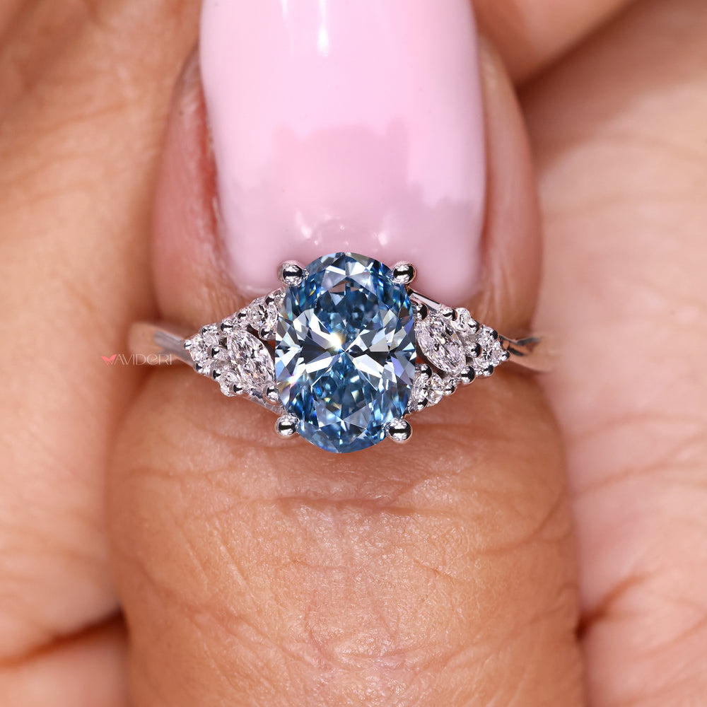 Handmade oval ring with marquise accents.
