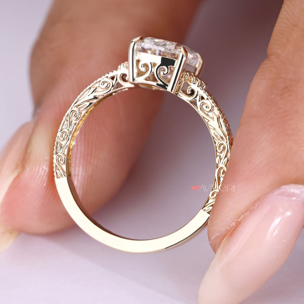 Handmade cushion diamond ring with vintage filigree.
