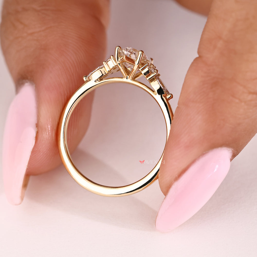 Four prong hexagon diamond ring with round side accents
